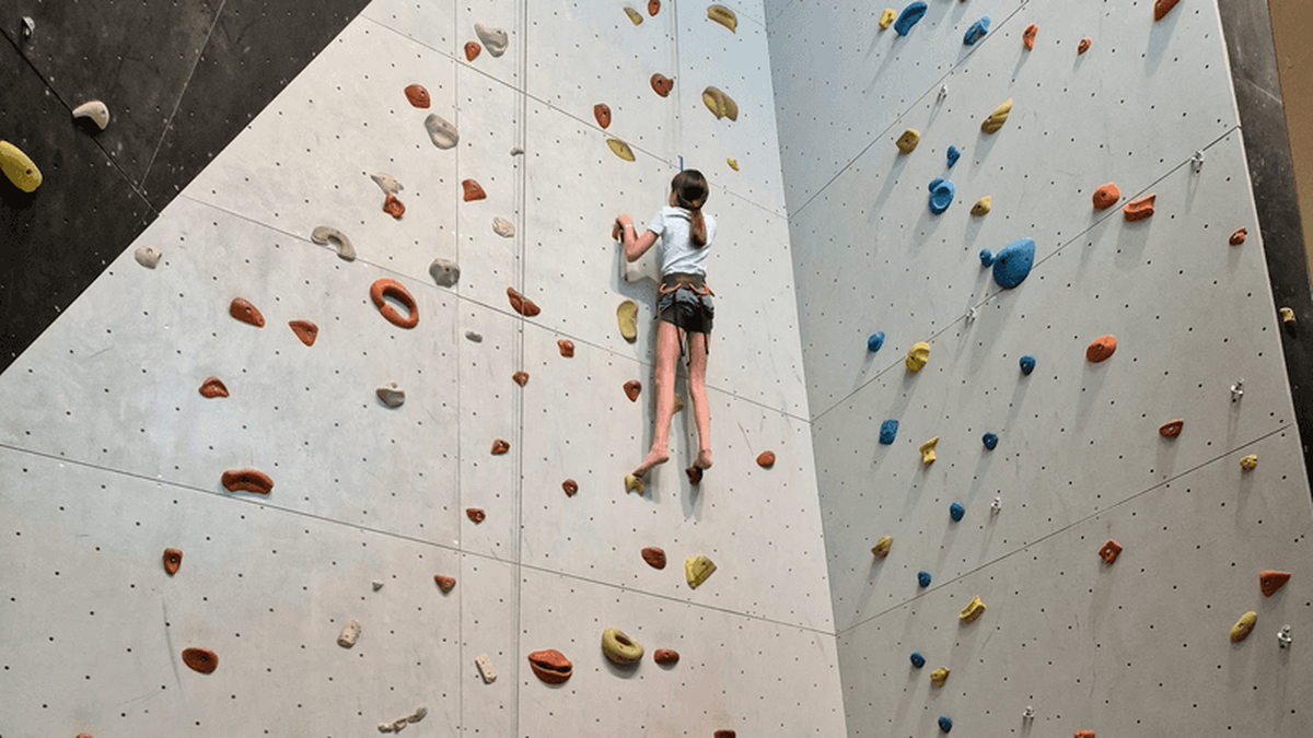  Our daughter tackling the indoor climbing wall. Photo credit: Elizabeth Heath 