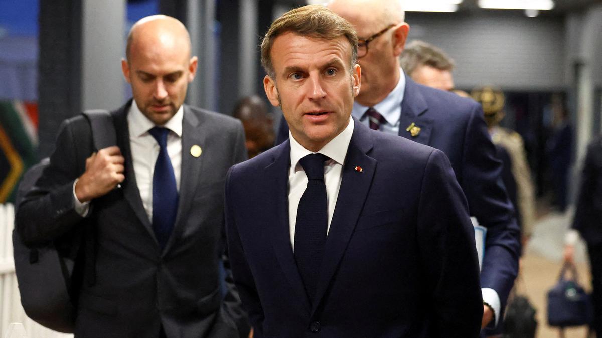 FILE PHOTO: France’s President Emmanuel Macron arrives to speak with members of the media on the sidelines of the G20 Leaders' Summit in Johannesburg, South Africa, November 22, 2025. REUTERS/Siphiwe Sibeko/File Photo