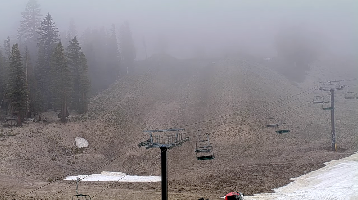  The storm is already settling in at Mammoth Mountain with light rain and fog. Webcam image captured at 11:40 a.m. PST on May 26, 2026.