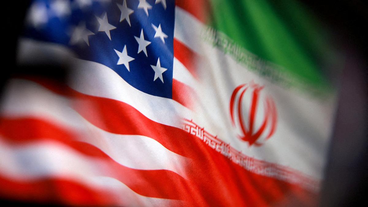 FILE PHOTO: U.S. and Iranian flags are seen in this illustration taken March 23, 2026. REUTERS/Dado Ruvic/Illustration/File Photo