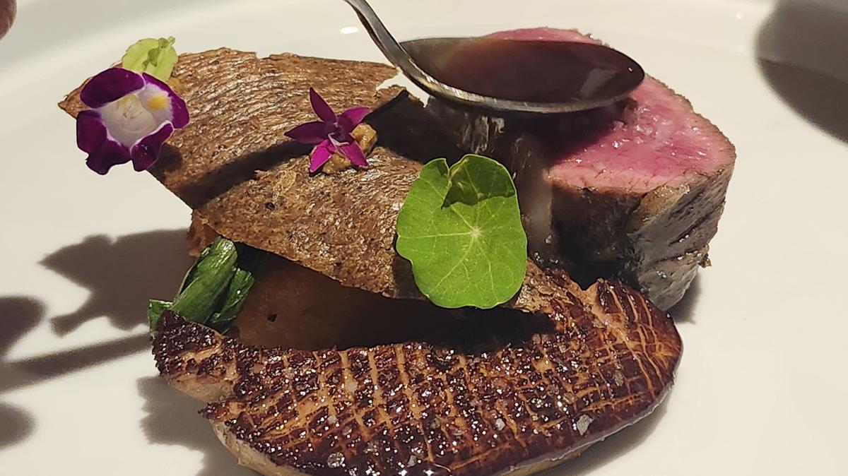 Lamb entree with the $35 seared filet of foie gras upgrade at Foreigner Restaurant: transcendent. (Amy Drew Thompson/Orlando Sentinel)