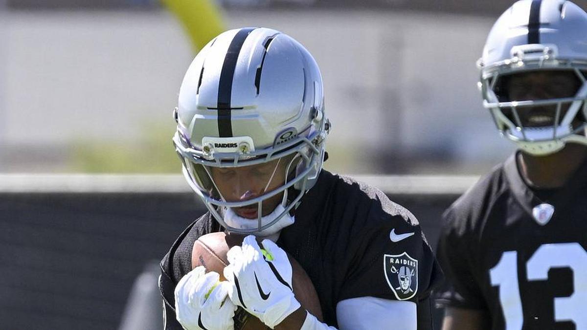  May 20, 2026; Henderson, NV, USA; Las Vegas Raiders wide receiver Tre Tucker (1) practices during organized team activities at Intermountain Health Performance Center. Mandatory Credit: Candice Ward-Imagn Images | Candice Ward-Imagn Images 