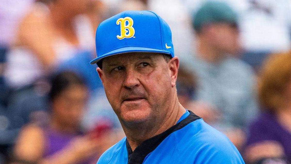  Jun 16, 2025; Omaha, Neb, USA; UCLA Bruins head coach John Savage walks off the field before the game against the LSU Tigers at Charles Schwab Field. Mandatory Credit: Dylan Widger-Imagn Images | Dylan Widger-Imagn Images 