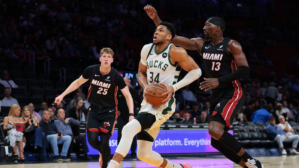  Mar 12, 2026; Miami, Florida, USA; Milwaukee Bucks forward Giannis Antetokounmpo (34) drives to the basket against Miami Heat center Bam Adebayo (13) during the first quarter at Kaseya Center. Mandatory Credit: Sam Navarro-Imagn Images | Sam Navarro-Imagn Images 