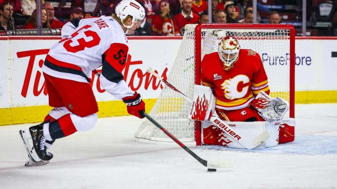 Flames turn tables on Hurricanes, notch first home win of season 