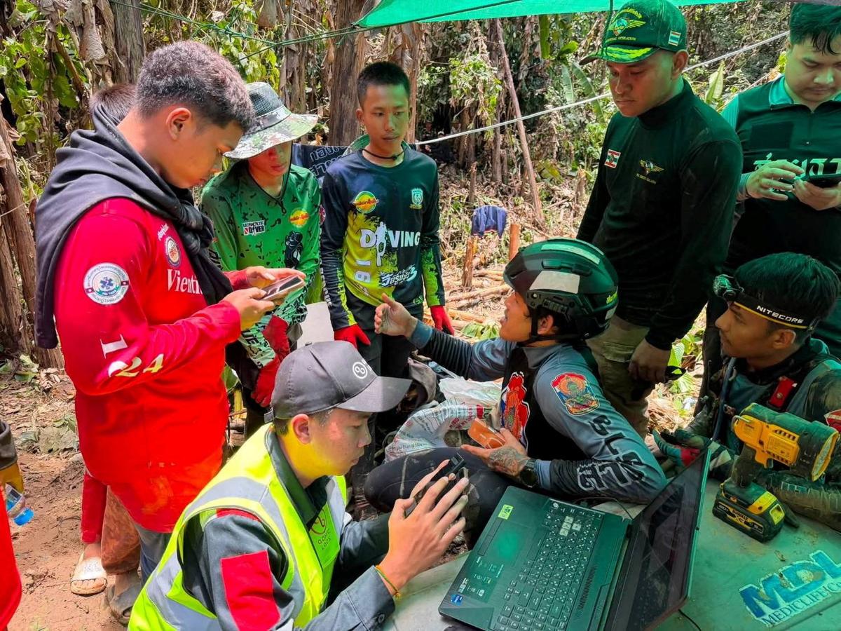 Members of a rescue team work to save seven people trapped in a cave, at a location given as Xaisomboun Province, Laos, in this handout image released May 25, 2026. Metta Tham Kalasin Rescue/Handout via REUTERS