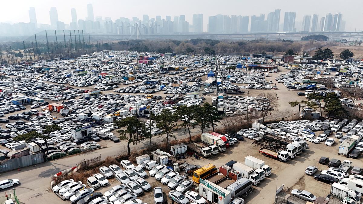 FILE PHOTO: A drone view of used cars that are mostly exported to countries in the Middle East remain parked at a used-car export complex in Incheon, South Korea, March 16, 2026.   REUTERS/Kim Hong-Ji     TPX IMAGES OF THE DAY/File Photo