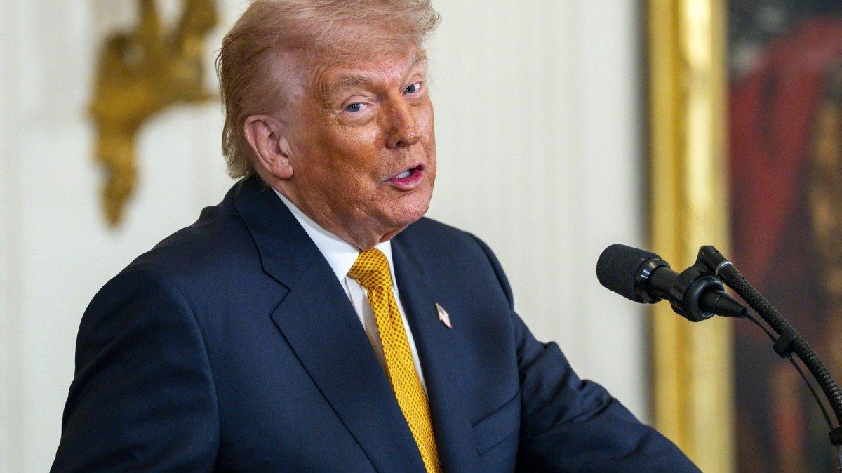 President Donald Trump speaks in the East Room of the White House.