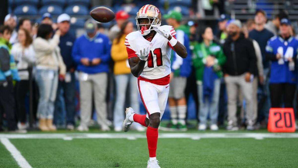  Oct 10, 2024; Seattle, Washington, USA; San Francisco 49ers wide receiver Brandon Aiyuk (11) catches the ball during warmups before the game against the Seattle Seahawks at Lumen Field. Mandatory Credit: Steven Bisig-Imagn Images | Steven Bisig-Imagn Images 