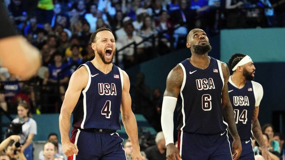  Stephen Curry (4) and guard LeBron James (6) of Team USA react in the second half against France in the men's basketball gold medal game during the Paris 2024 Olympic Summer Games at Accor Arena in Paris, France, on August 10, 2024. | USA TODAY Network via Reuters Connect 