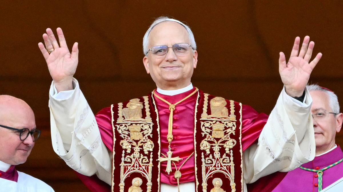 Newly elected Pope Leo XIV, Robert Prevost, arrives on the main central loggia balcony of the St Peter’s Basilica.
