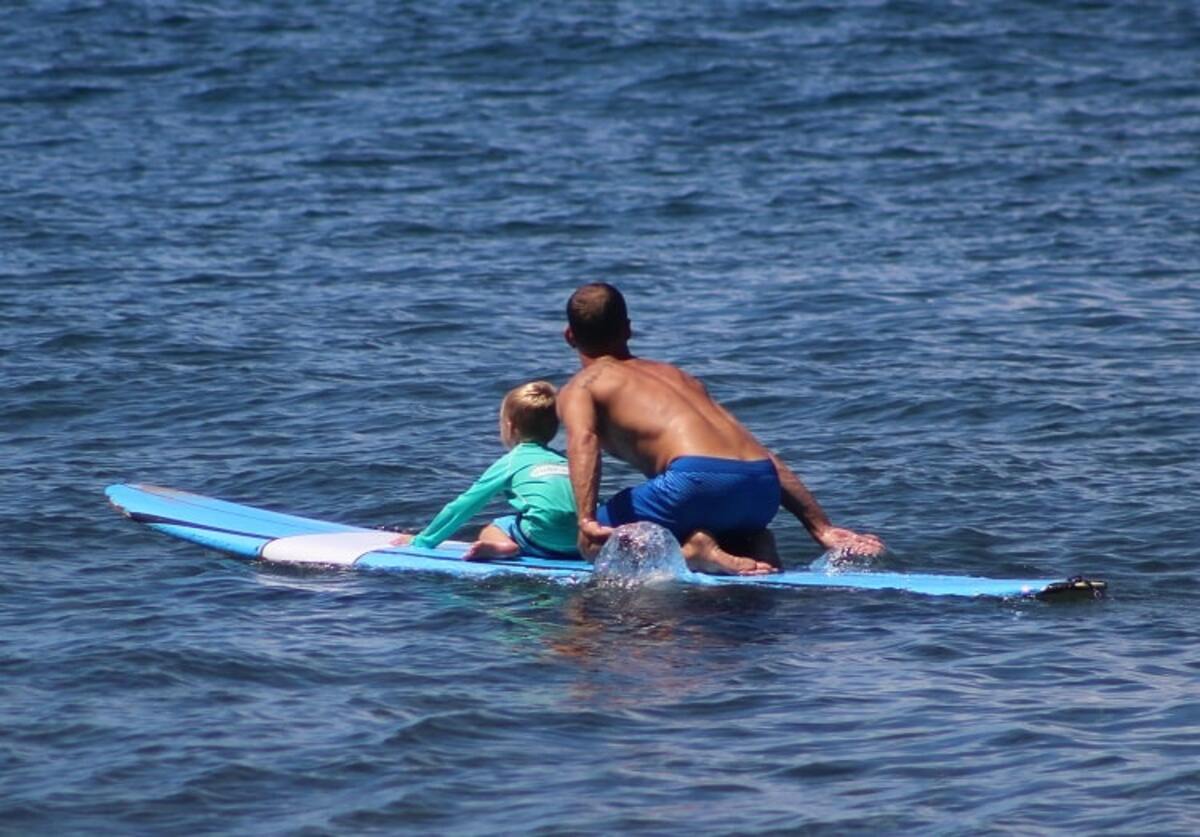  Father and son surfing together along the Kaanapali beaches in Maui. Photo credit: Deb Steenhagen 