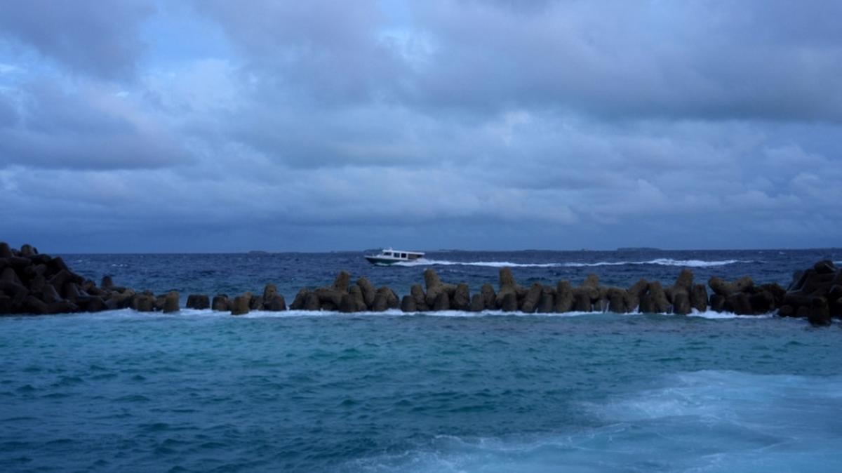 A speed boat moves in the waters of the Indian Ocean near Male, after a specialist team located the bodies of four missing Italian scuba divers who died in an accident in underwater caves, Maldives, May 18, 2026. REUTERS/Thilina Kaluthotage