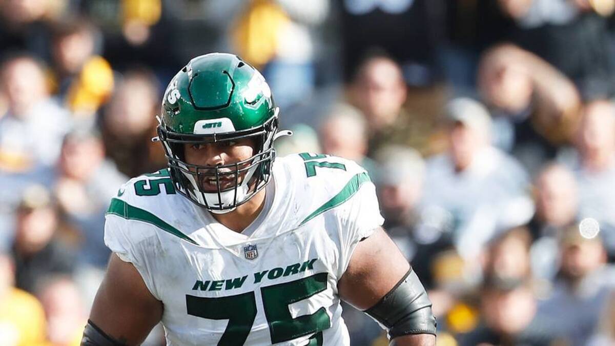  Oct 2, 2022; Pittsburgh, Pennsylvania, USA; New York Jets guard Alijah Vera-Tucker (75) blocks at the line of scrimmage against the Pittsburgh Steelers during the fourth quarter at Acrisure Stadium. Mandatory Credit: Charles LeClaire-USA TODAY Sports | USA TODAY Sports 