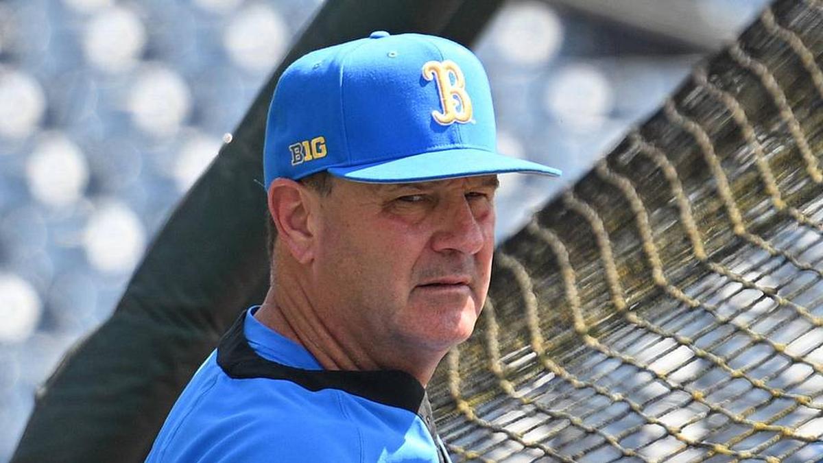  Jun 14, 2025; Omaha, Neb, USA; UCLA Bruins head coach John Savage watches the team warm up before the game against the Murray State Races at Charles Schwab Field. Mandatory Credit: Steven Branscombe-Imagn Images | Steven Branscombe-Imagn Images 