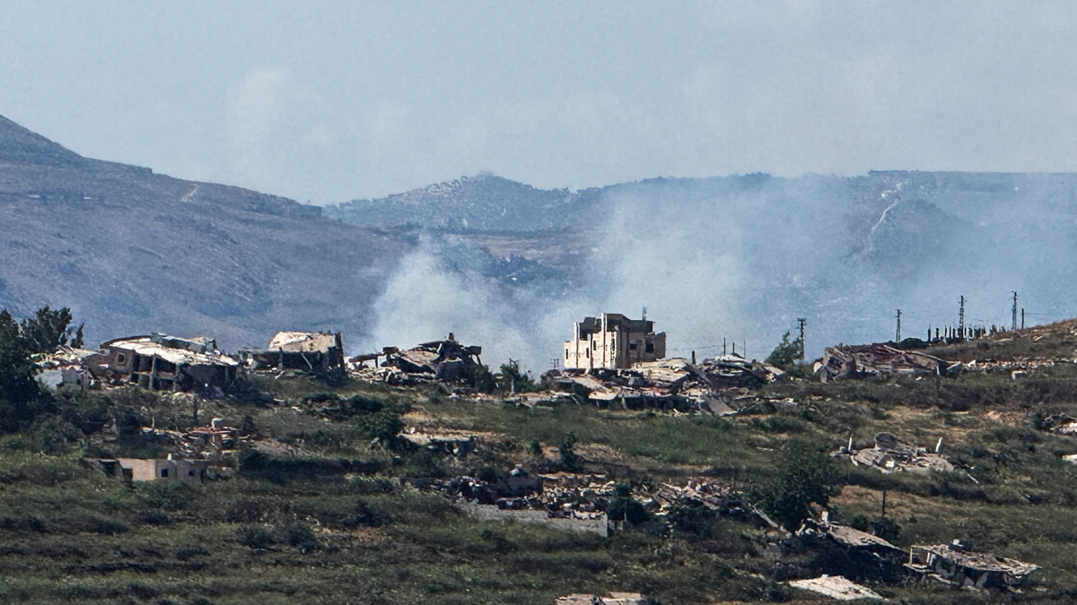 Smoke rises near destroyed structures in southern Lebanon, as seen from the Israeli side of the Israel-Lebanon border, in northern Israel, June 14, 2026. Picture taken with a mobile phone. REUTERS/Avi Ohayon