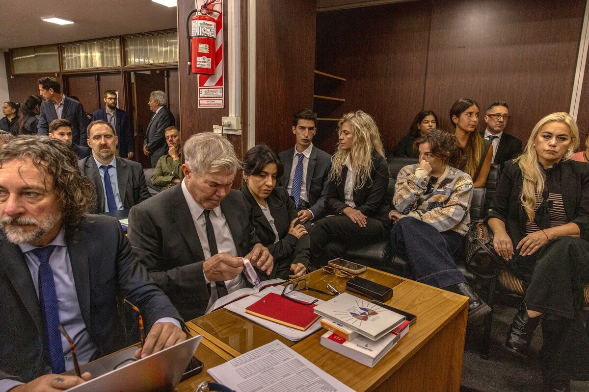 Gianinna Maradona, third from left, and Dalma Maradona, second from right, in a courtroom before the start of the trial for Diego Maradona's death in Buenos Aires, Argentina, April 14, 2026. A multimillion-dollar battle for a soccer god's brand is being waged across continents, burning investors and tearing his family apart. (Sarah Pabst/The New York Times)