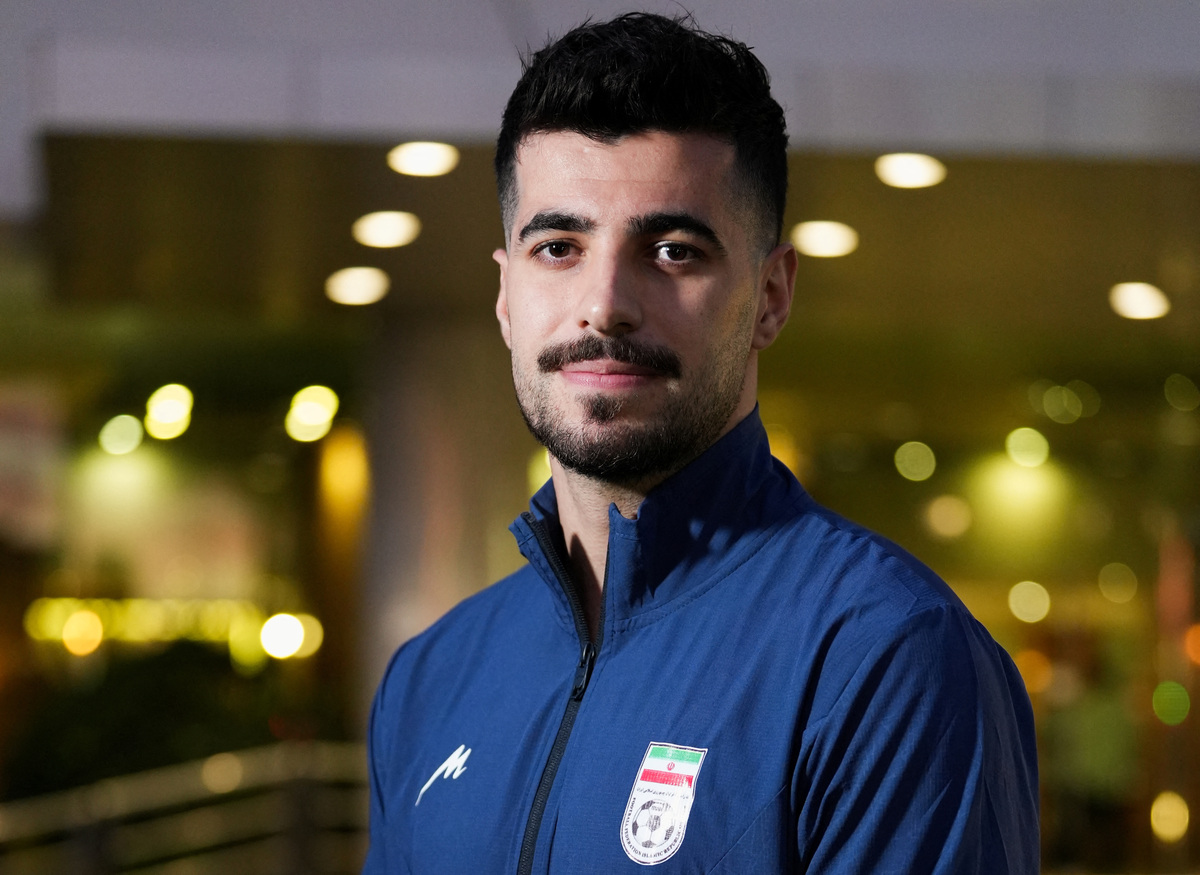 Iran national soccer player Saeid Ezzatollahi attends an interview with Reuters at the team's hotel in Tijuana, where a small Iranian community reflects broader political divisions within the diaspora ahead of the team’s World Cup campaign, in Tijuana, Mexico, June 11, 2026. REUTERS/Aimee Melo