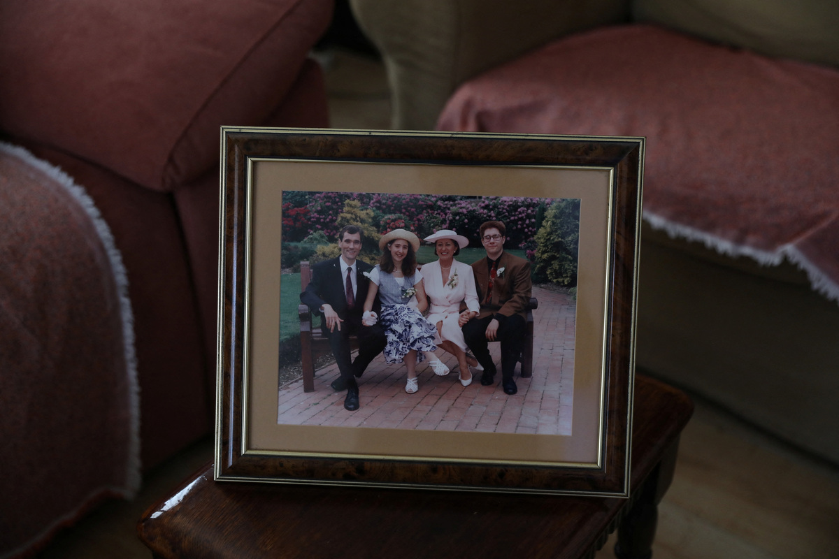 A framed family photograph showing Carole Bentley, 80, her late husband John, and their children Daniel Northover, 53, and Leigh, on their wedding day in England, is displayed in the living room of the family home in Turre, Almeria, Spain, June 18, 2026. REUTERS/ Loyola Perez de Villegas Muniz