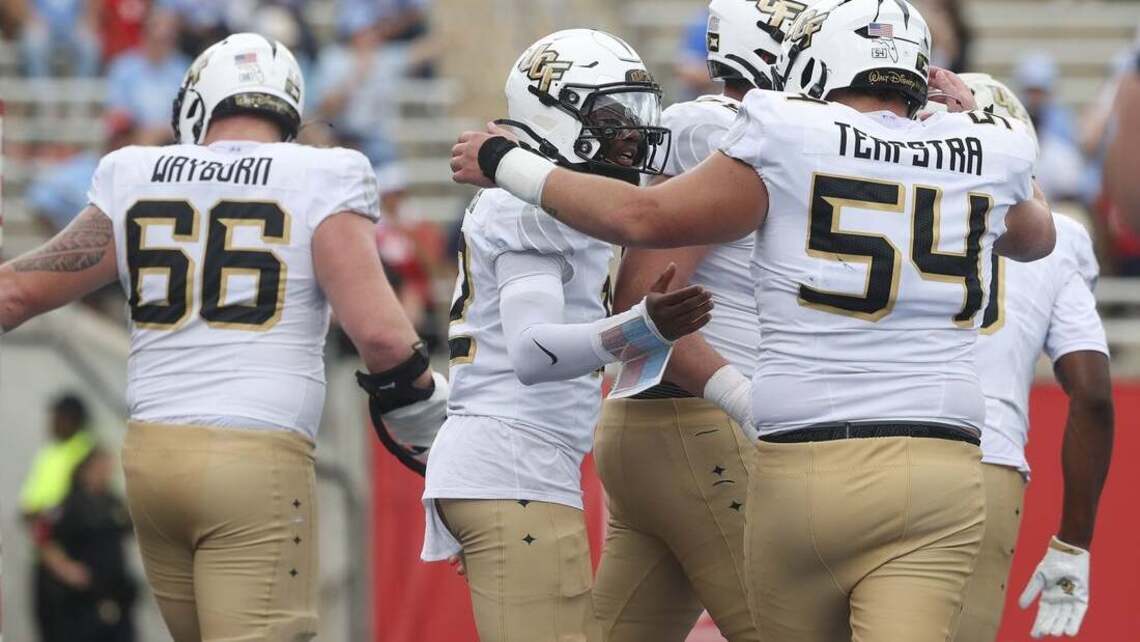 UCF riding high off upset win as interim coach brings Baylor to town 
