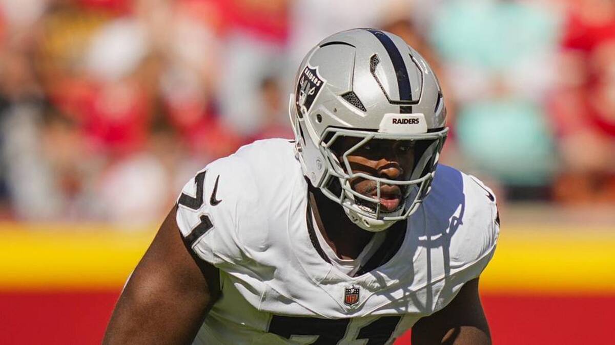  Oct 19, 2025; Kansas City, Missouri, USA; Las Vegas Raiders offensive tackle DJ Glaze (71) gets ready prior to the snap during the first half against the Kansas City Chiefs at GEHA Field at Arrowhead Stadium. Mandatory Credit: Jay Biggerstaff-Imagn Images | Jay Biggerstaff-Imagn Images 