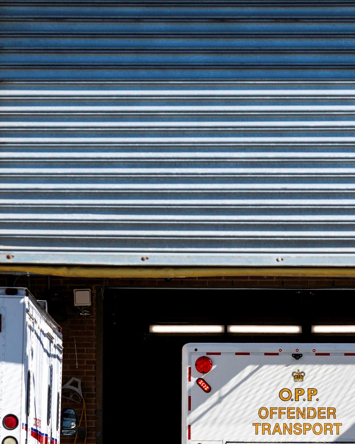 An Ontario Provincial Police offender transport vehicle arrives at the Superior Court of Justice, on the day when Kenneth Law, accused of selling lethal substances to people who later took their own lives, is expected to plead guilty to 14 counts of aiding suicide, in Newmarket, Ontario, Canada May 29, 2026. REUTERS/Carlos Osorio