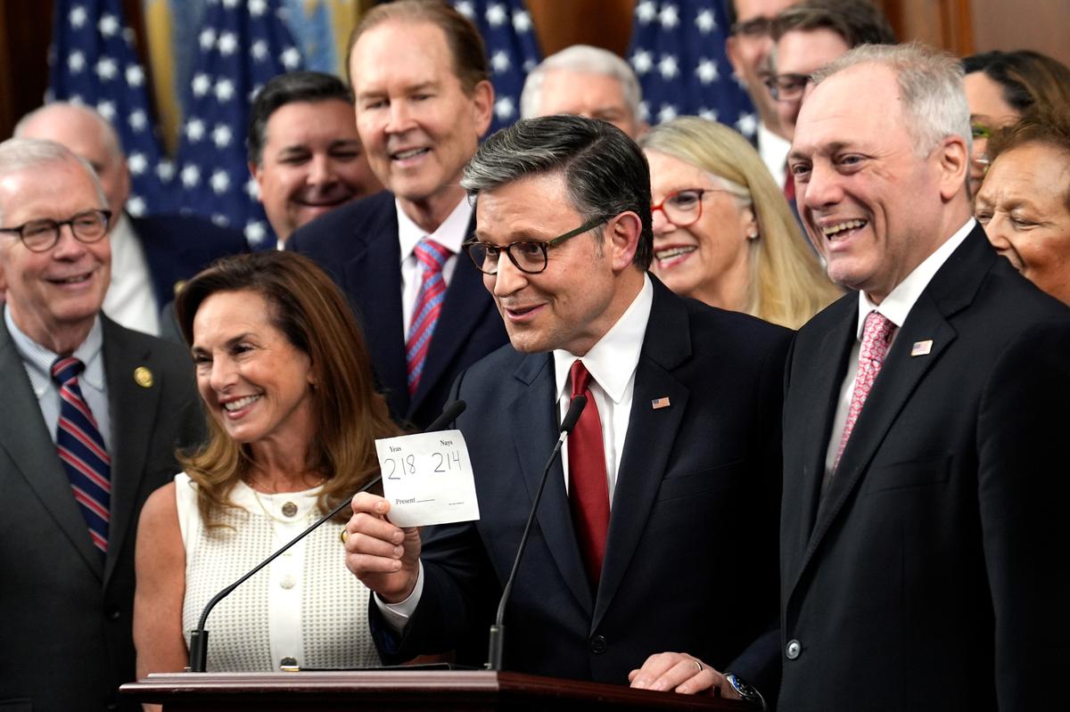 House Speaker Mike Johnson and Republican leaders celebrate after the vote on President Donald Trump’s “One Big Beautiful Bill Act” on Capitol Hill in Washington, D.C., on Thursday, July 3, 2025. (Yuri Gripas/Abaca Press/TNS)
