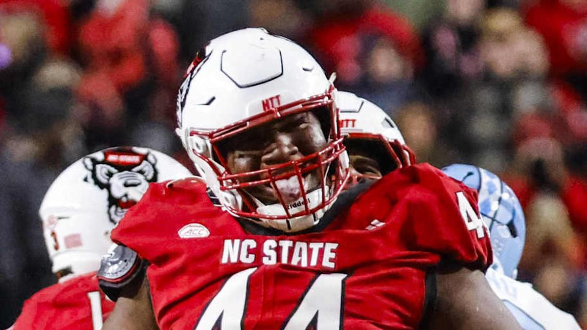  Nov 29, 2025; Raleigh, North Carolina, USA; NC State Wolfpack defensive tackle Brandon Cleveland (44) reacts to his tackle during the first half of the game against North Carolina Tar Heels at Carter-Finley Stadium. Mandatory Credit: Jaylynn Nash-Imagn Images | Jaylynn Nash-Imagn Images 