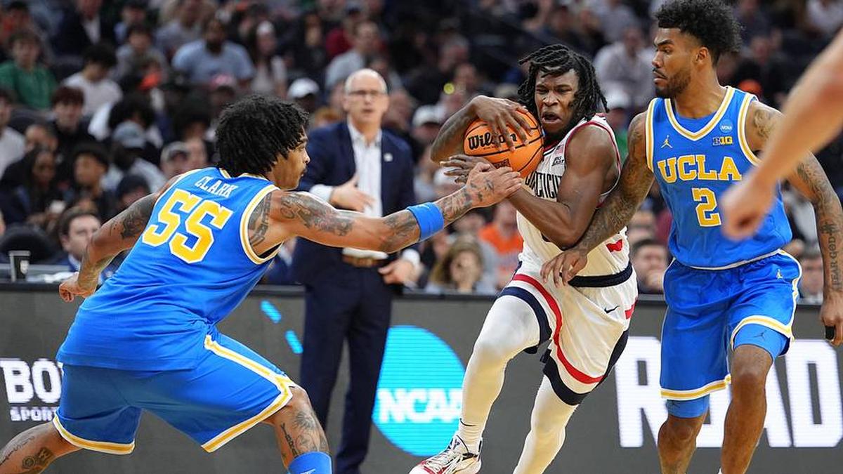  Mar 22, 2026; Philadelphia, PA, USA; UConn Huskies guard Malachi Smith (0) dribbles the ball against the UCLA Bruins in the second half during a second round game of the men's 2026 NCAA Tournament at Xfinity Mobile Arena. Mandatory Credit: Kyle Ross-Imagn Images | Kyle Ross-Imagn Images 