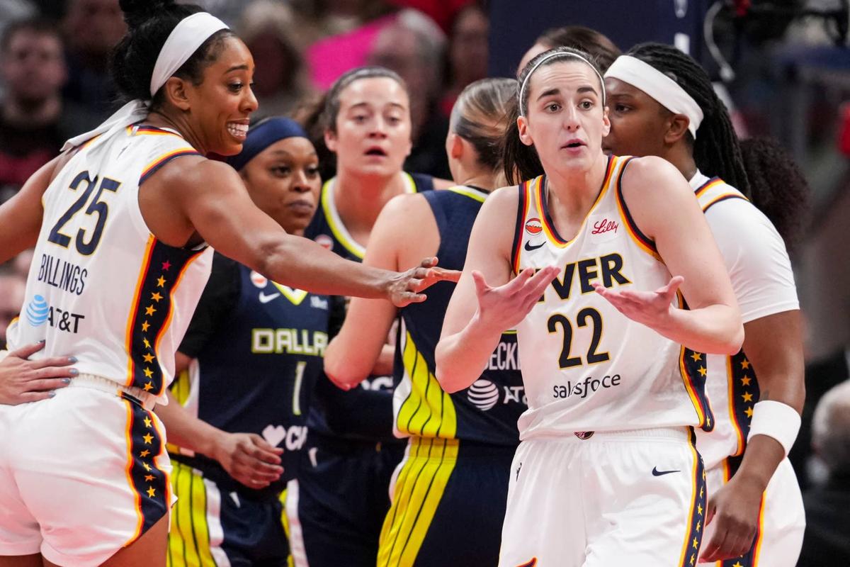  Indiana Fever guard Caitlin Clark talks to a game official during pre-season game versus Dallas Wings Grace Smith/IndyStar / USA TODAY NETWORK via Imagn Images