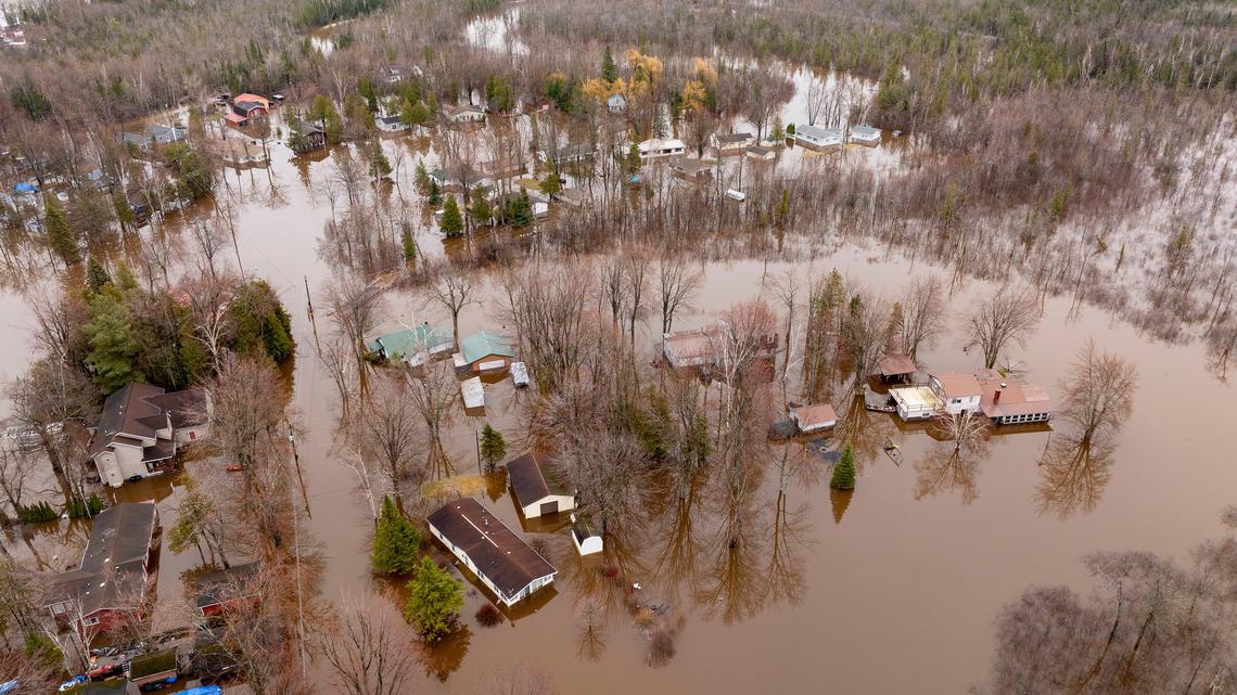 Flooded homes can be seen along Crist Isle Drive, on Michigan's Black Lake on Thursday, April 16, 2026. (David Guralnick/The Detroit News/TNS)