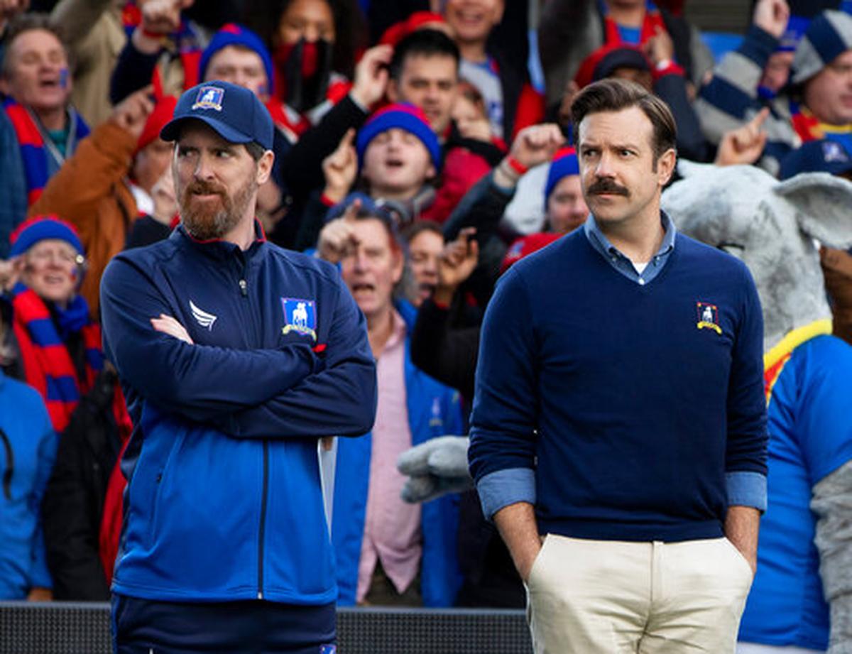 Jason Sudeikis, right, is the title character in “Ted Lasso,” nominated for two Golden Globes and two Screen Actors Guild Awards. Brendan Hunt co-stars.