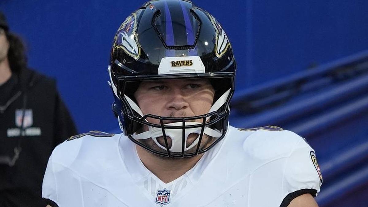  Sep 7, 2025; Orchard Park, New York, USA; Baltimore Ravens center Tyler Linderbaum (64) and center Corey Bullock (67) enter the field for warm up prior to the game against the Buffalo Bills at Highmark Stadium. Mandatory Credit: Gregory Fisher-Imagn Images | Gregory Fisher-Imagn Images 