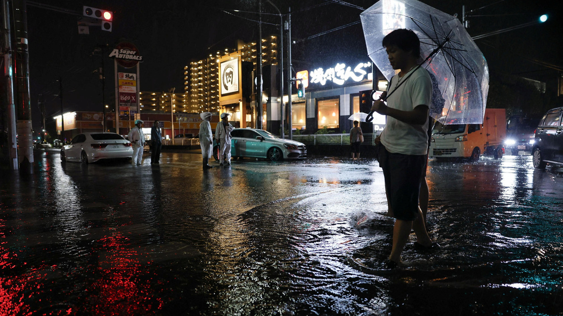 Japan's record rains strand thousands at Narita airport; kill eight