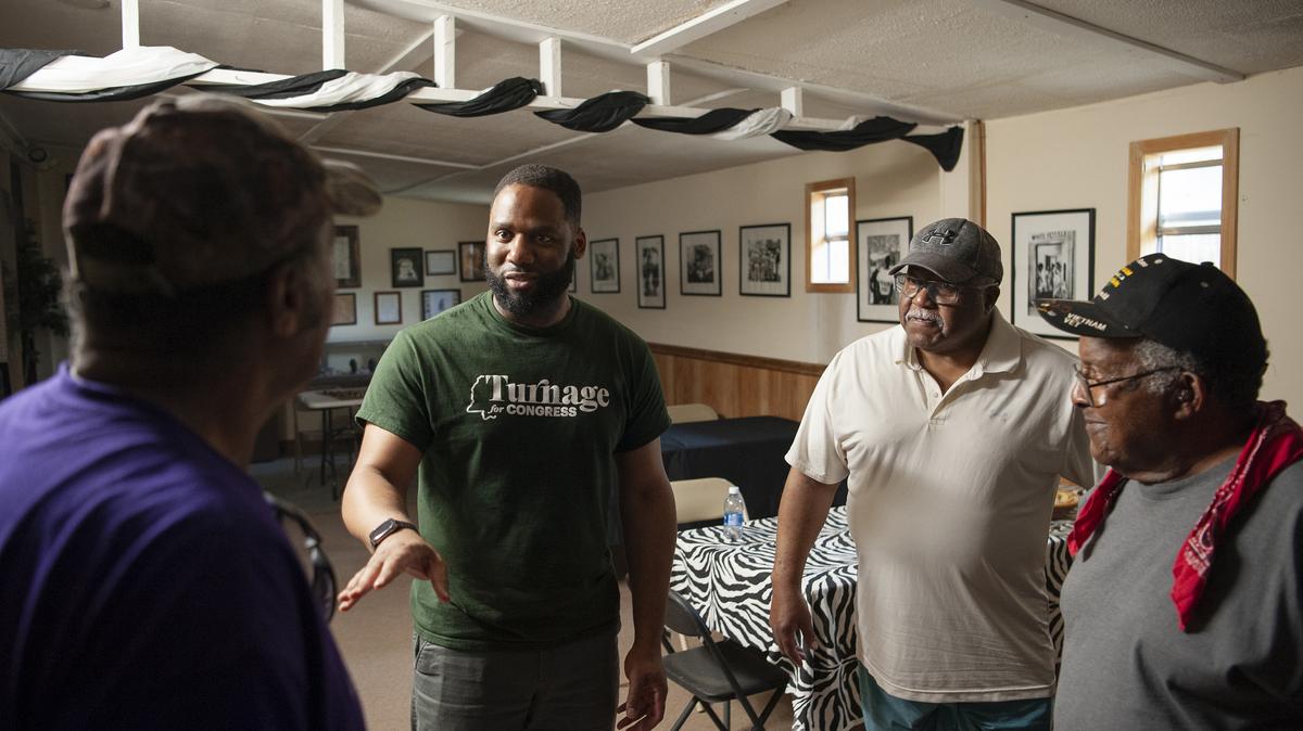 Congressional candidate Evan Turnage listens to residents at a gathering at Community Outreach Services of Leake County in Walnut Grove, Miss., on March 7. Black Democrats in the South already face steep challenges when seeking political office. But the Supreme Court's ruling on a Voting Rights Act section could be felt for a generation.