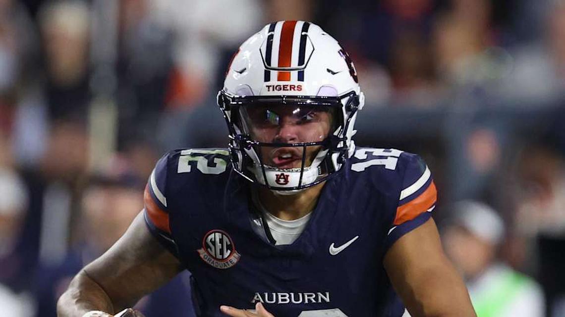  Nov 29, 2025; Auburn, Alabama, USA; Auburn Tigers quarterback Ashton Daniels (12) during the second half against the Alabama Crimson Tide at Jordan-Hare Stadium. Mandatory Credit: John Reed-Imagn Images | John Reed-Imagn Images 