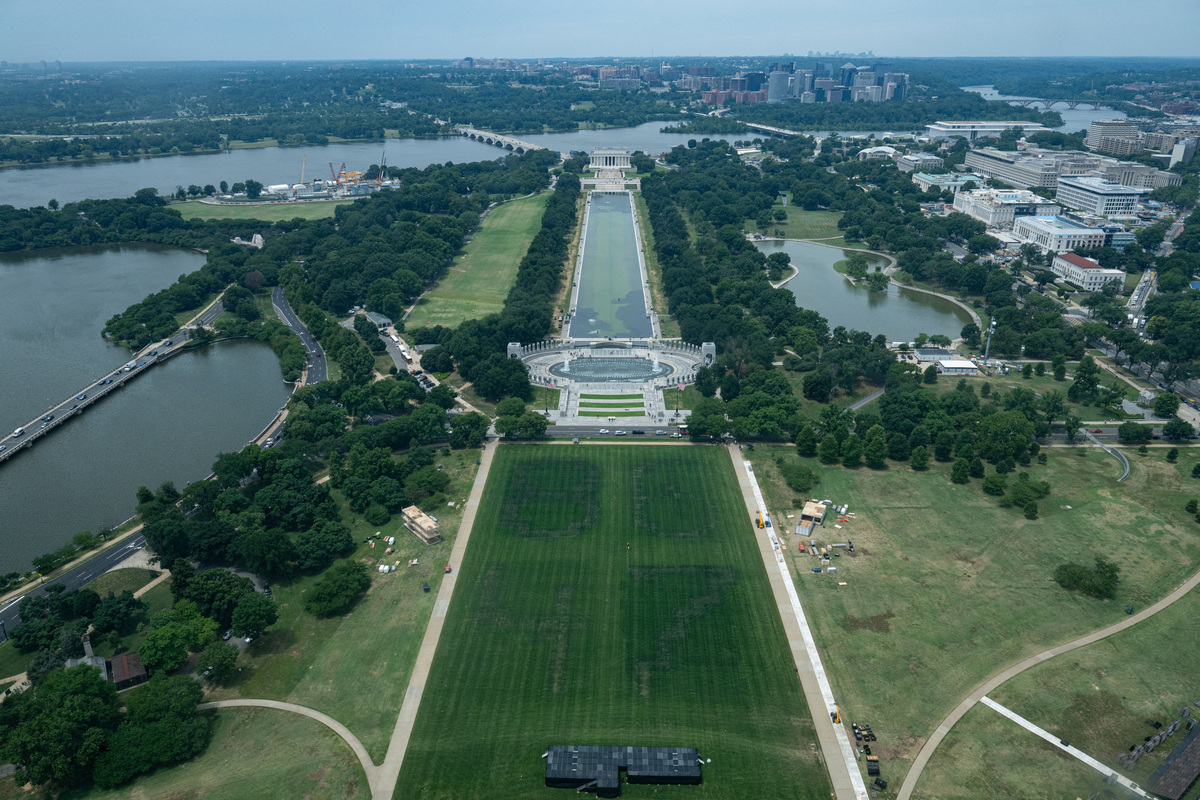 The remnants of markings depicting the numbers 8647 are seen near the Lincoln Memorial Reflecting Pool after recent renovations following a directive from U.S. President Donald Trump to paint it blue ahead of the 250th anniversary of U.S. Independence, in Washington, D.C., U.S., June 18, 2026. REUTERS/Annabelle Gordon