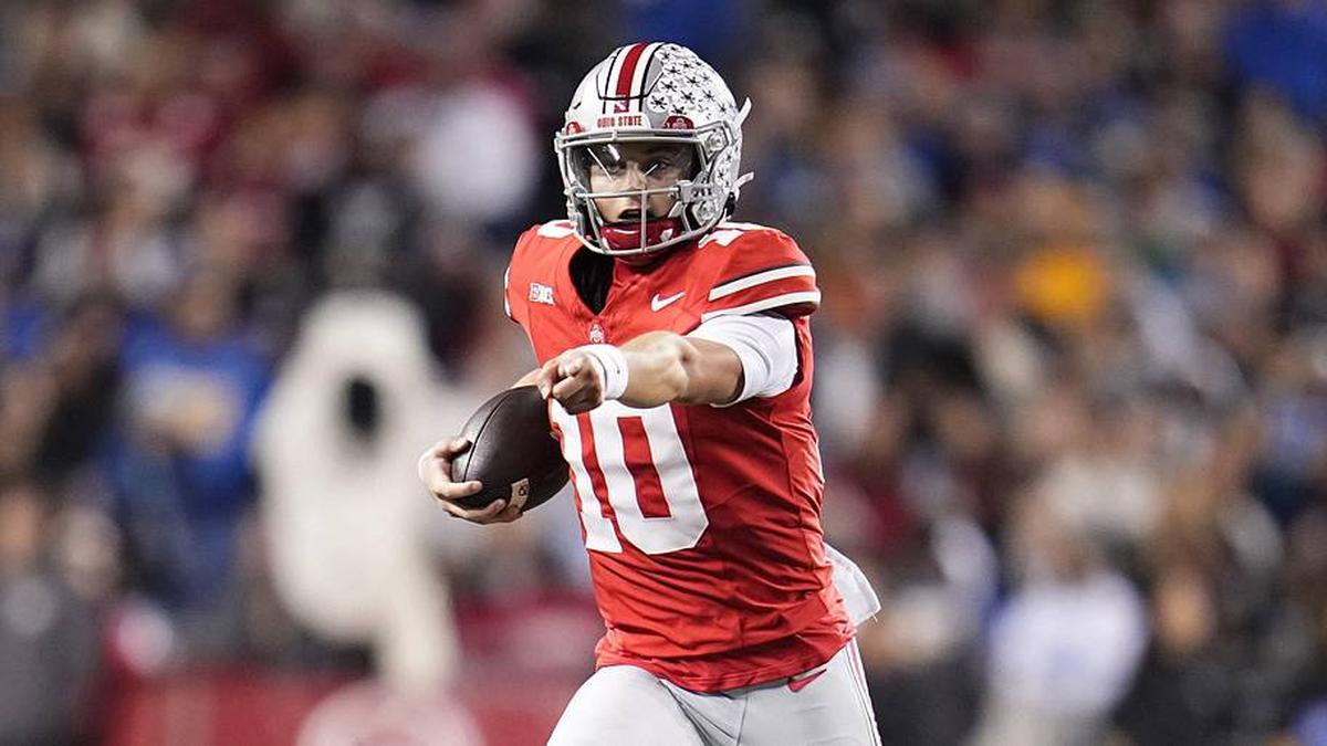  Ohio State Buckeyes quarterback Julian Sayin (10) runs during the NCAA football game against the UCLA Bruins at Ohio Stadium in Columbus on Nov. 15, 2025. | Adam Cairns/Columbus Dispatch / USA TODAY NETWORK via Imagn Images 