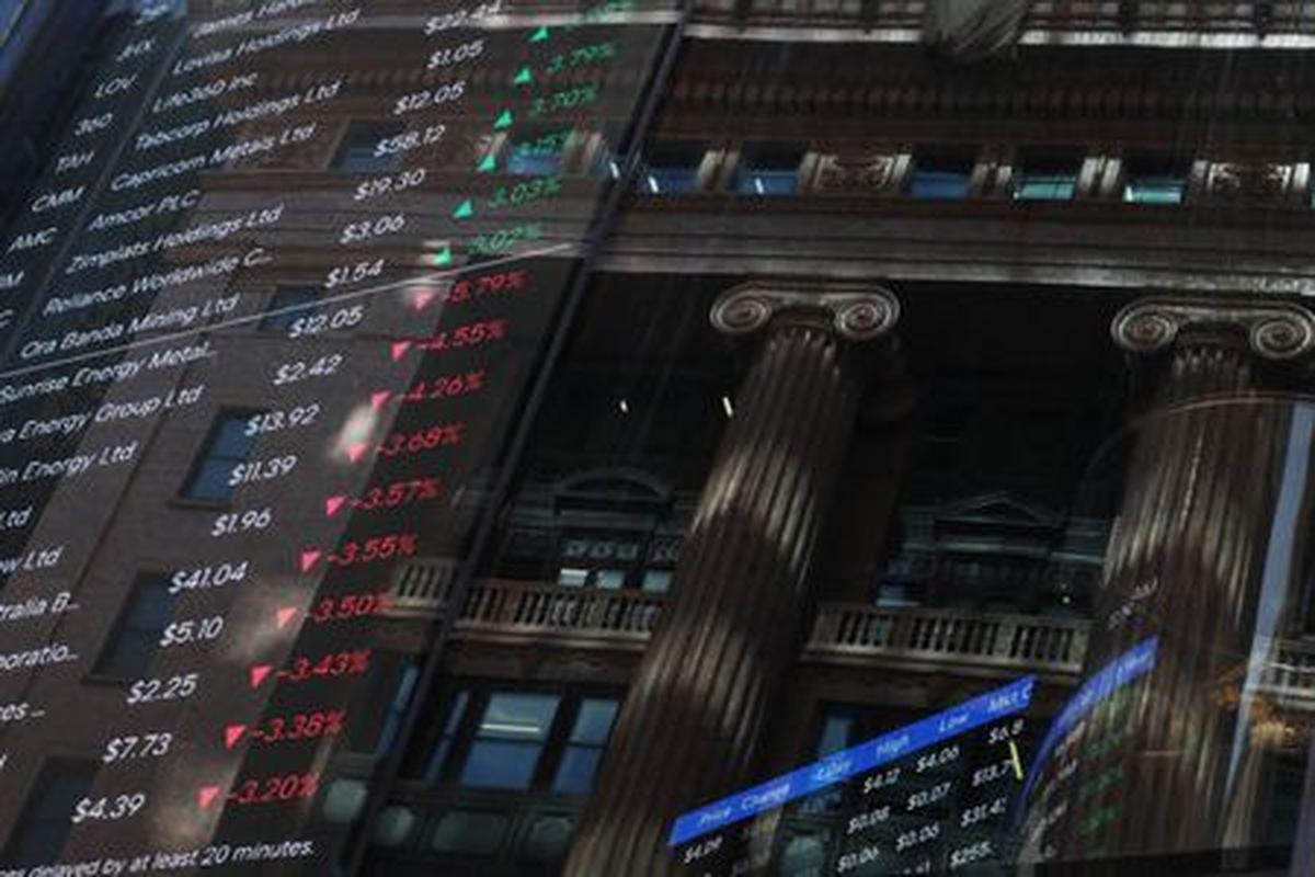 Stock prices are displayed on a market board at the Australian Securities Exchange, in Sydney, Australia, April 20, 2026. REUTERS/Hollie Adams