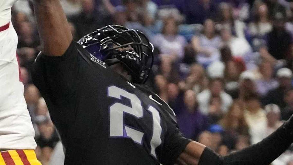  Dec 30, 2025; San Antonio, TX, USA; Southern California Trojans running back Bryan Jackson (21) attempts to catch the ball against TCU Horned Frogs safety Bud Clark (21) in the first half during the Alamo Bowl at Alamodome. Mandatory Credit: Kirby Lee-Imagn Images | Kirby Lee-Imagn Images 