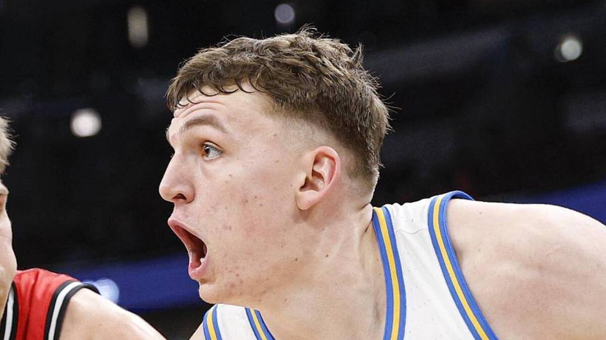  Mar 12, 2026; Chicago, IL, USA; UCLA Bruins forward Tyler Bilodeau (34) drives to the basket against Rutgers Scarlet Knights guard Harun Zrno (13) during the second half at United Center. Mandatory Credit: Kamil Krzaczynski-Imagn Images | Kamil Krzaczynski-Imagn Images 