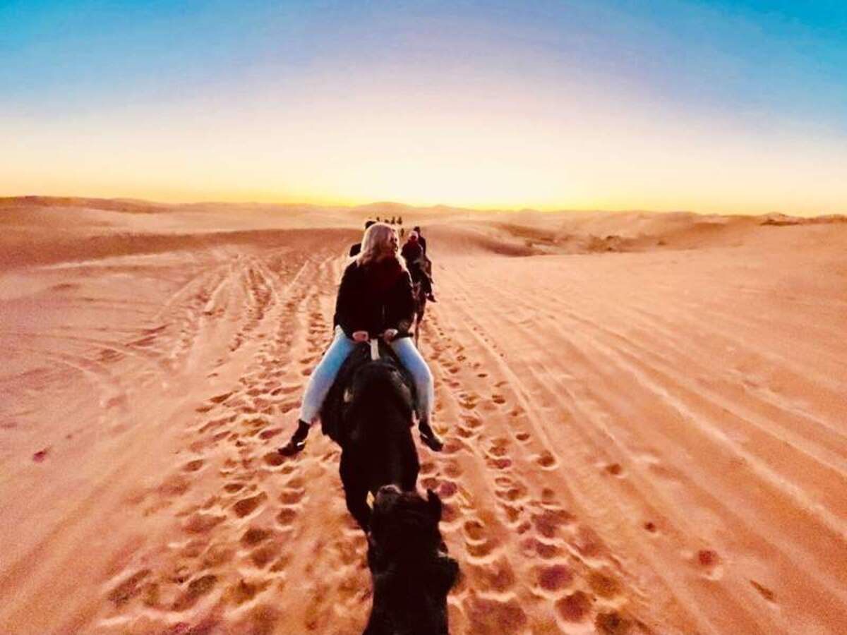  Watching the sunrise over the Sahara Desert in Morocco. Photo credit: Shelly Peterson 