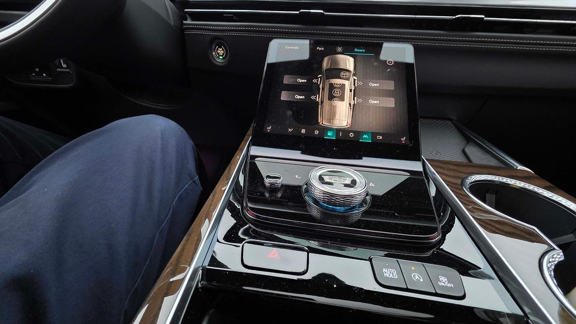Auto review: In the Cadillac Escalade, there's always a button for that 