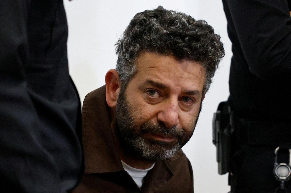 FILE PHOTO: Activist Saif Abu Keshek, a Spanish national, who was detained aboard the Gaza-bound Global Sumud Flotilla, which was intercepted by Israeli forces in international waters, appears at a court in Beersheba, southern Israel May 6, 2026. REUTERS/Amir Cohen/File Photo