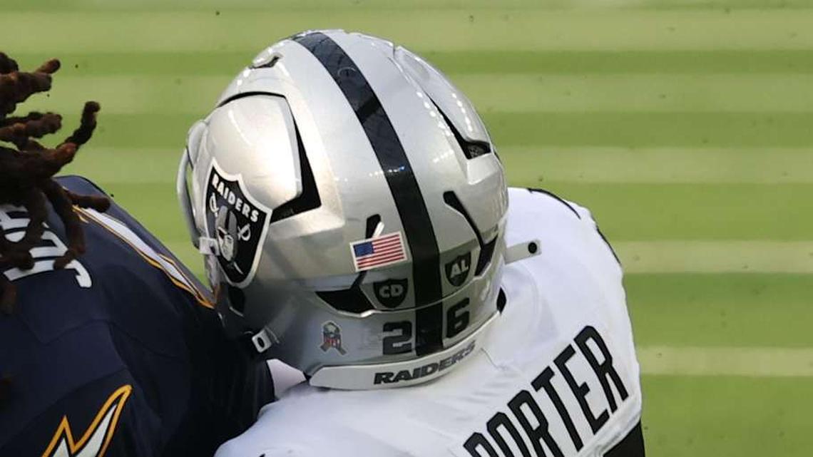  Nov 30, 2025; Inglewood, California, USA; Los Angeles Chargers wide receiver Quentin Johnston (1) makes a catch against the Las Vegas Raiders cornerback Darien Porter (26) during the first half at SoFi Stadium. Mandatory Credit: Kiyoshi Mio-Imagn Images | Kiyoshi Mio-Imagn Images 