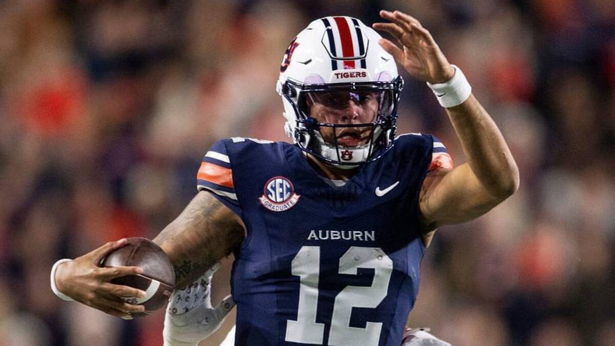  Auburn Tigers quarterback Ashton Daniels (12) runs the ball as Auburn Tigers take on Alabama Crimson Tide in the Iron Bowl at Jordan-Hare Stadium in Auburn, Ala. on Saturday, Nov. 29, 2025. Alabama Crimson Tide leads Auburn Tigers 17-6. | Jake Crandall/ Advertiser / USA TODAY NETWORK via Imagn Images 