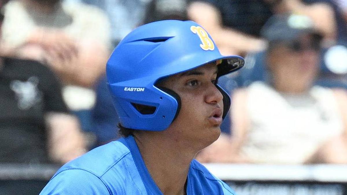  Jun 14, 2025; Omaha, Neb, USA; UCLA Bruins first baseman Mulivai Levu (39) singles against the Murray State Racers during the first inning at Charles Schwab Field. Mandatory Credit: Steven Branscombe-Imagn Images | Steven Branscombe-Imagn Images 