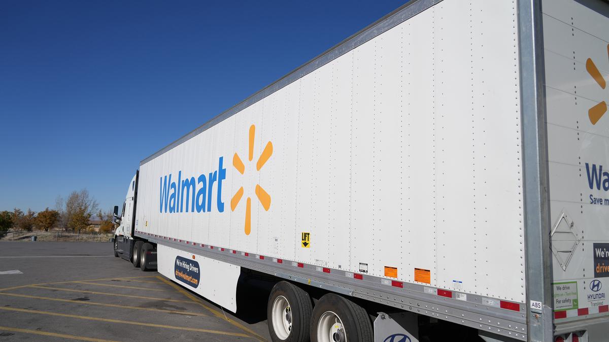 A Walmart truck pulls away after fueling up at the Loves Truck stop in Springville, Utah, on Nov. 5, 2021. The world’s largest retailer warned that rising fuel costs are squeezing the company’s bottom line and could lead to higher prices for shoppers.
