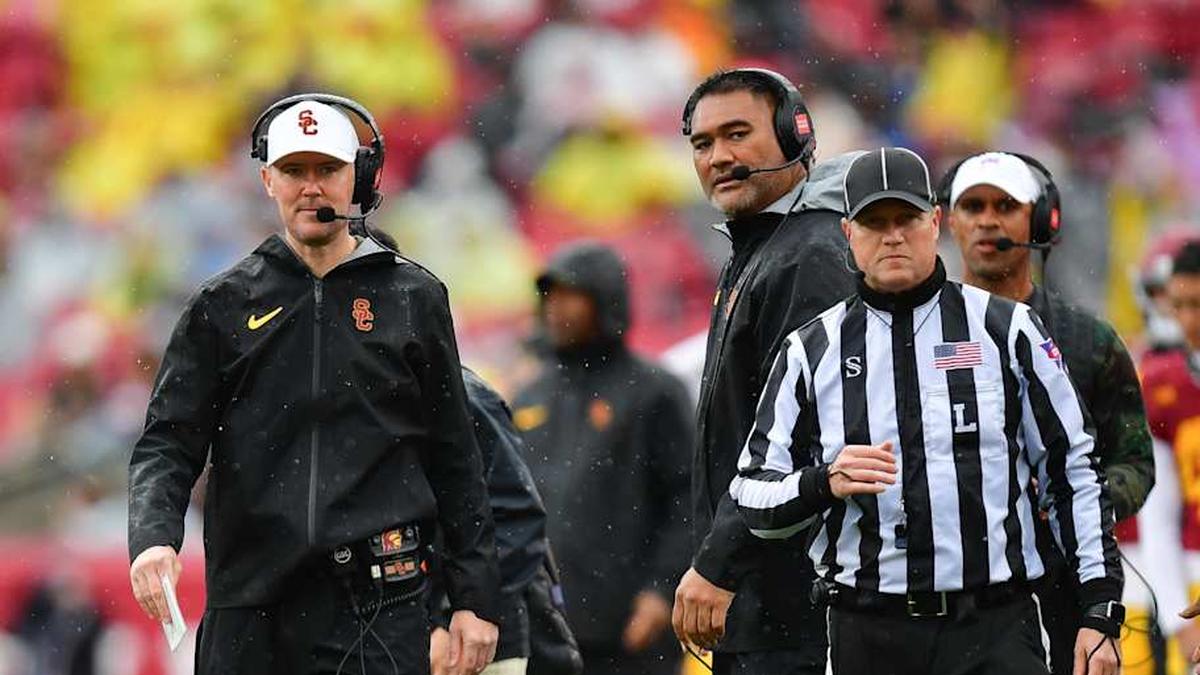  Nov 15, 2025; Los Angeles, California, USA; Southern California Trojans head coach Lincoln Riley watches game action against the Iowa Hawkeyes during the first half at the Los Angeles Memorial Coliseum. Mandatory Credit: Gary A. Vasquez-Imagn Images | Gary A. Vasquez-Imagn Images 