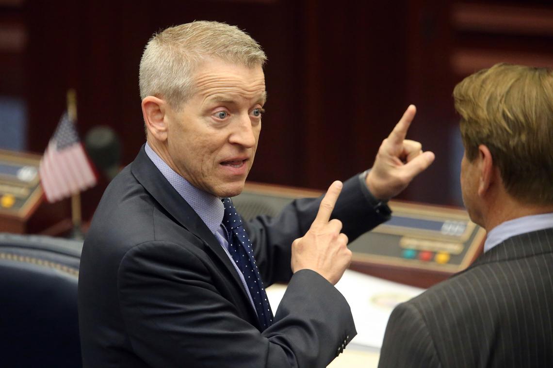 Rep. Paul Renner, R-Palm Coast, left, confers with Rep. Thad Altman, R-Indialantic, prior to the start of a special session on May 19, 2021, in Tallahassee, Fla.